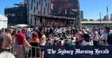 Crowd gathers for free Robbie Williams event in Melbourne