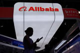 Alibaba quarterly profit drops 75% as AI investment spending grows | AP News