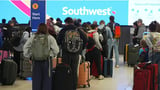 Fight onboard Southwest flight forces plane to return to Phoenix airport as holiday travel hits...