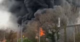 Manchester fire LIVE: Smoke seen across Wythanshaw after 'explosions' reported