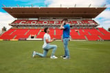 Trailblazing gay footballer Josh Cavallo proposes to partner on pitch