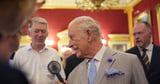 King feels the heat in stifling conditions at climate event