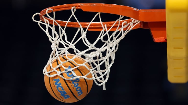 College Basketball Point-Shaving Scandal: 26 Indicted in Alleged Scheme Exposing Ethics Crisis