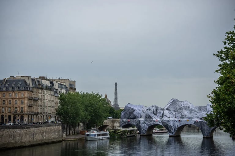 Paris Transforms Iconic Bridge with Giant Inflatable Art Cavern by JR