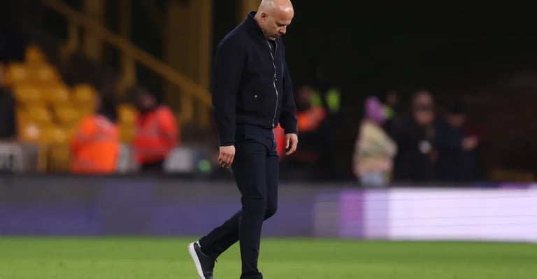 Wolves Stun Liverpool with Last-Minute Goal; Reds Struggle in Top-Four Race