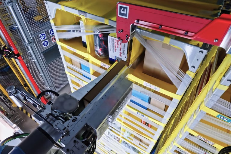 Amazon's Vulcan Robots Boost Warehouse Efficiency, Create Jobs Amid Automation Concerns