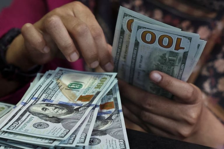 Dollar Holds Strong as Traders Eye US Inflation; Fed's Future in Focus Amid Trump's Rate Cut Calls