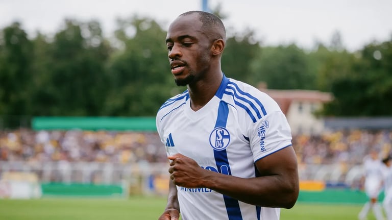 Racism in German Football: Players Targeted with Abuse, Authorities Urged to Act