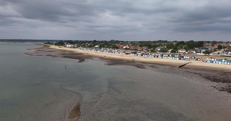 Tragic Drowning at West Mersea Beach: Teen and Woman Dead, Child Critical as Investigation Continues