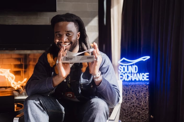 Shaboozey Honored as 2024 Breakout Artist, Achieves Historic No. 1 Streak with 'A Bar Song (Tipsy)'