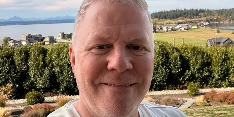 Microsoft Layoffs Highlight 'Great Flattening' and AI Shift, Redefining Job Security in Tech Industry