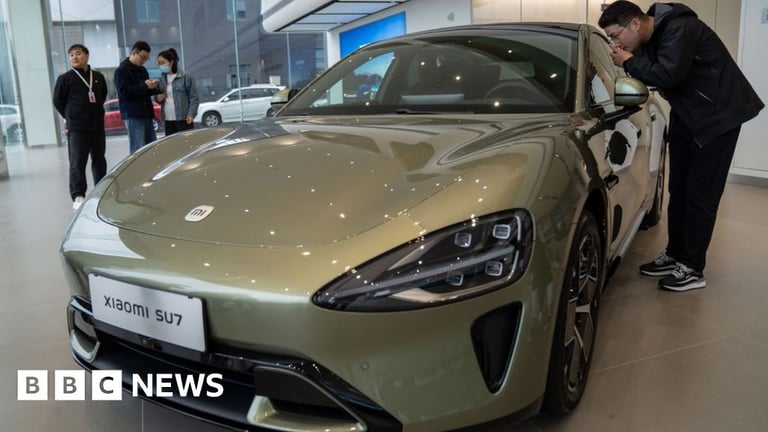 Xiaomi Unveils SU7 Electric Car to Rival Tesla in China