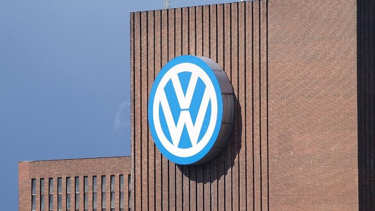 Volkswagen Secures German Job Stability Amid Cost Cuts, Workers Strike for Future Assurance