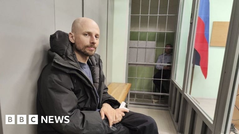 Russian Band Arrested for Nazi Symbols, Journalists Charged Amidst Media Crackdown