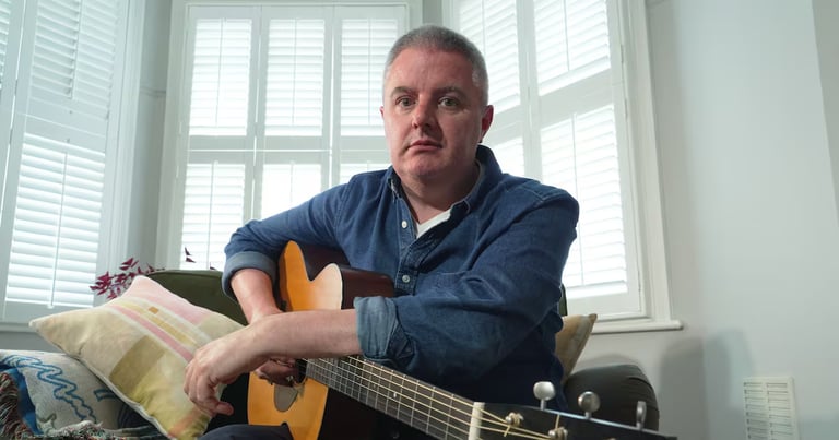 Musician with Parkinson's Completes Album Using AI, Sparking Debate on Creativity and Copyright