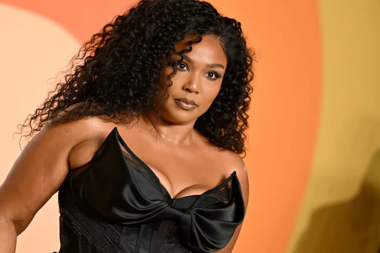 Lizzo Shines as Sports Illustrated Cover Star, Embraces Body Positivity and Self-Acceptance