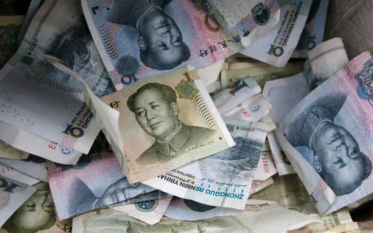 China's Markets Defy Global Trends: Yuan Strengthens, Bonds Attract Foreign Inflows Amid Skepticism