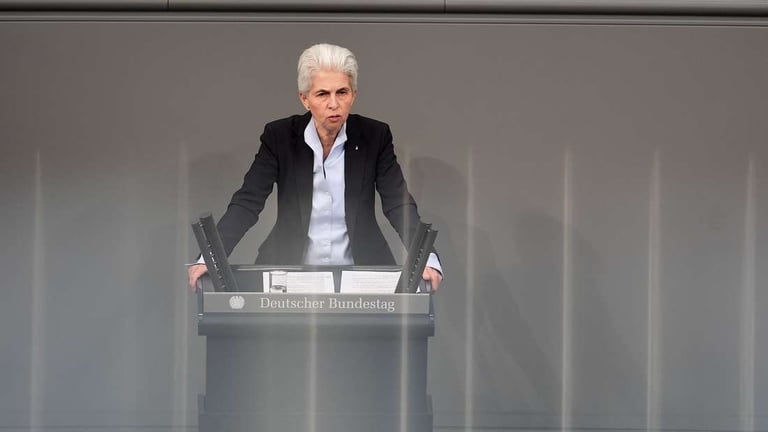 Macron Mulls Troops for Ukraine; Allies Balk, Russia Warns of War