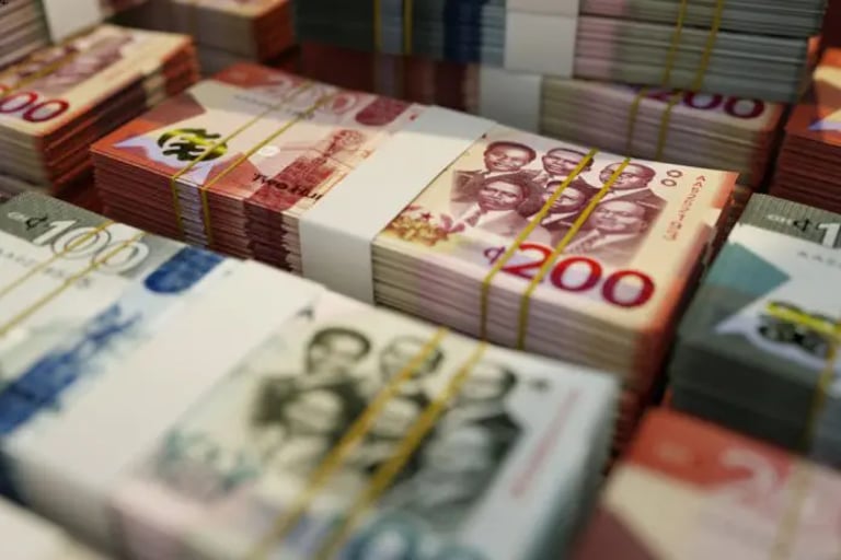 Ghana's Fintech Boom Threatens Cedi Stability, Calls for Urgent Policy Reforms