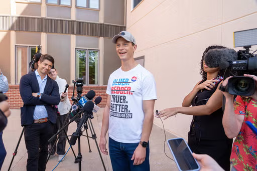 Iowa's Gubernatorial Race Heats Up: Democrats Launch Bid with Beshear's Support Amidst Intense GOP Spending