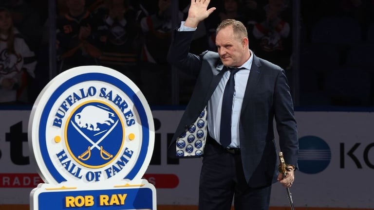 Tough as Ever: Rob Ray Struck by Puck, Continues Commentary Despite Injury