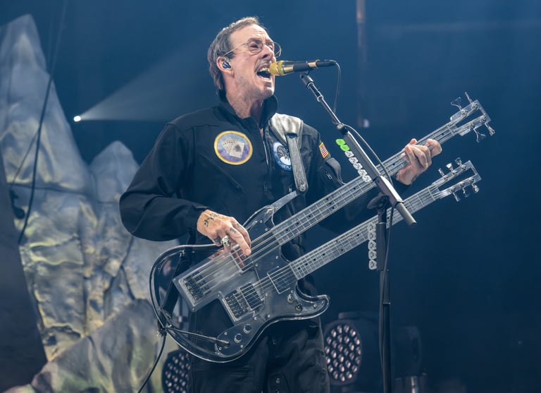 Weezer Bassist's Wife Faces Attempted Murder Charges Amid Coachella Preparations