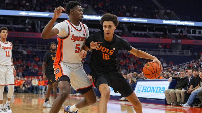 Syracuse Upsets No. 13 Tennessee 62-60: William Kyle III's Clutch Free Throws Seal Win