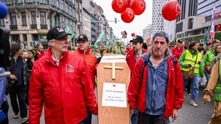 Belgium Faces Surge in Strikes: Delhaize Franchising and Anti-Riot Law Fuel Tensions