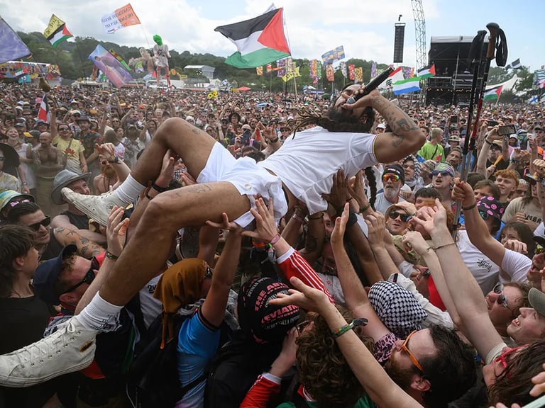 Glastonbury Controversy: Canadian MPs Push to Ban Bob Vylan Amid Hate Speech Allegations
