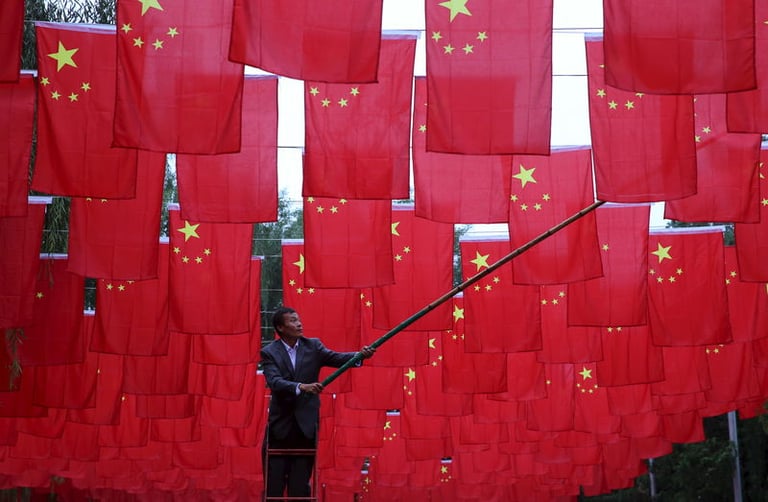 China Faces Deflationary Pressures Amid Stalled Housing Market, Trade Tensions