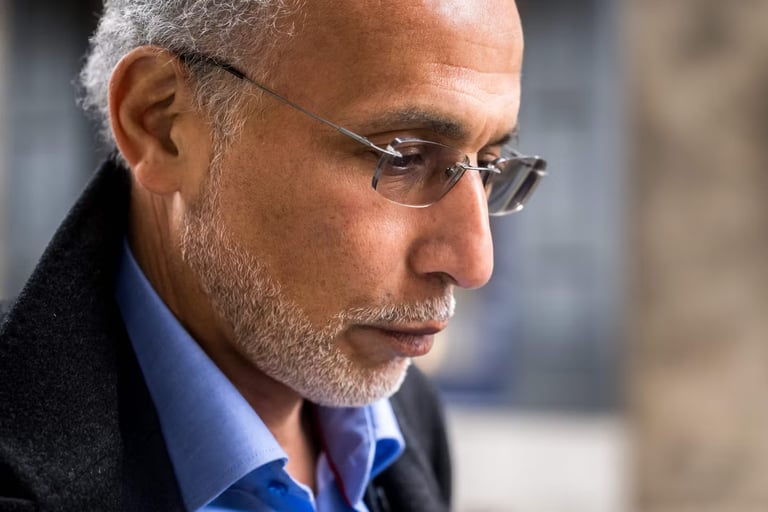 Tariq Ramadan Sentenced to 18 Years for Rape; Arrest Warrant Issued Amid Absence from Trial
