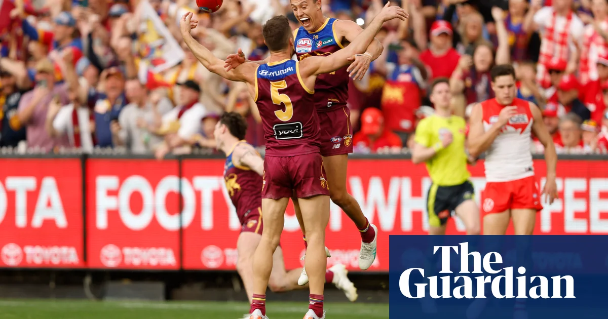 Brisbane bury their AFL demons as stubborn optimism turns into unbridled joy | Jonathan Horn