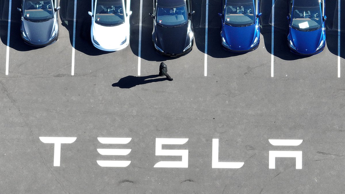 Tesla profits drop 55%, company says EV sales 'under pressure' from hybrids | TechCrunch