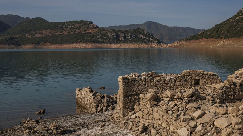 Sunken village emerges in Greece as drought dries up lake | CNN