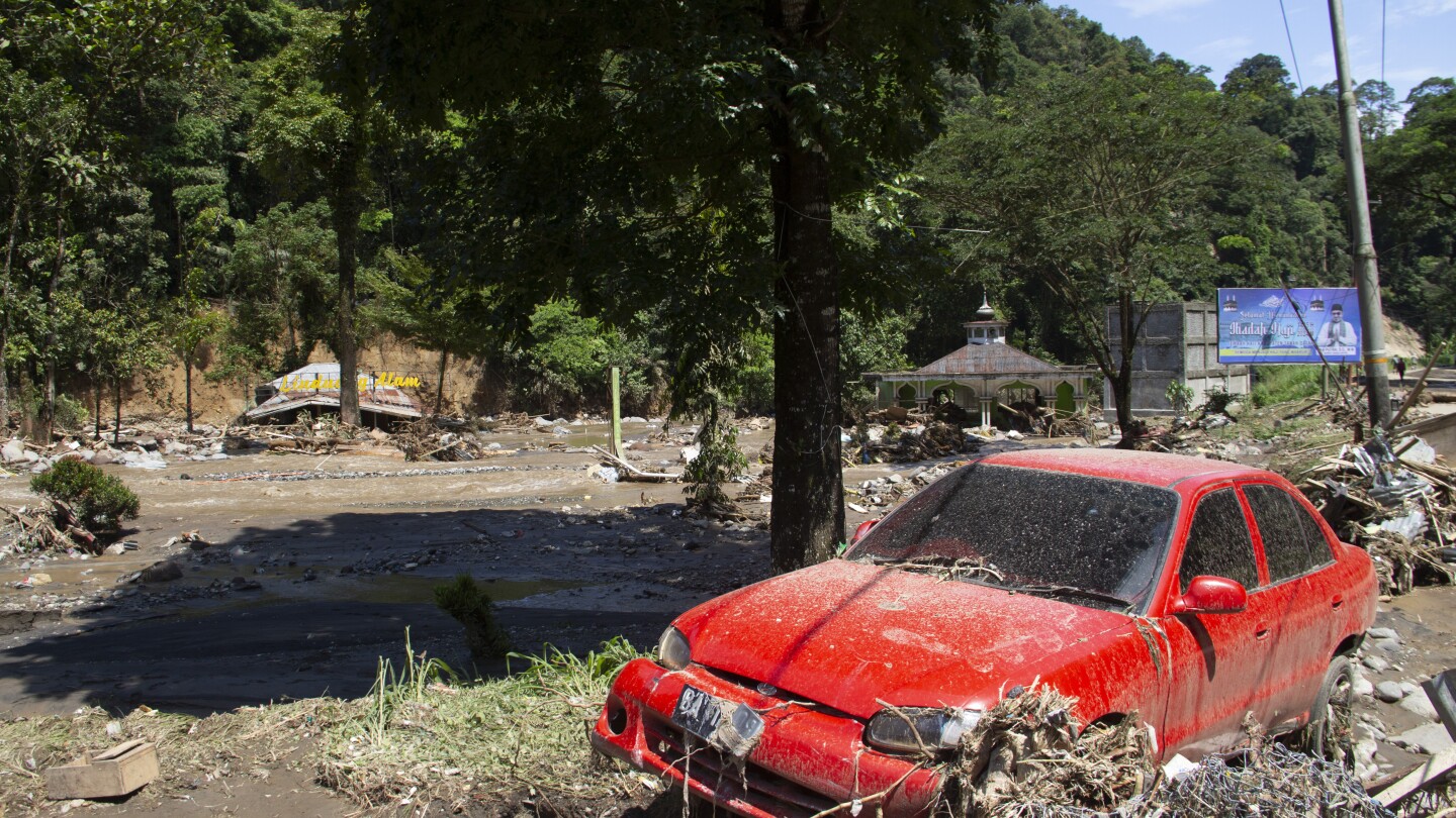 Flash floods and cold lava flow hit Indonesia’s Sumatra island. At least 37 people were killed