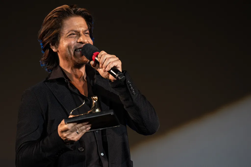 Shah Rukh Khan Charms Locarno Crowd As He Talks Stardom, Brad Pitt & Jackie Chan Friendship: “He Promised To Open A Chinese Restaurant With Me”