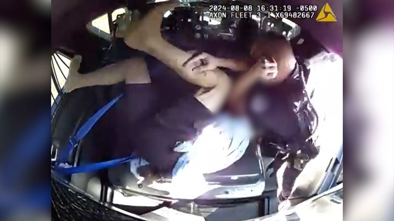 Video shows police officer beating detainee in back of patrol car | CNN