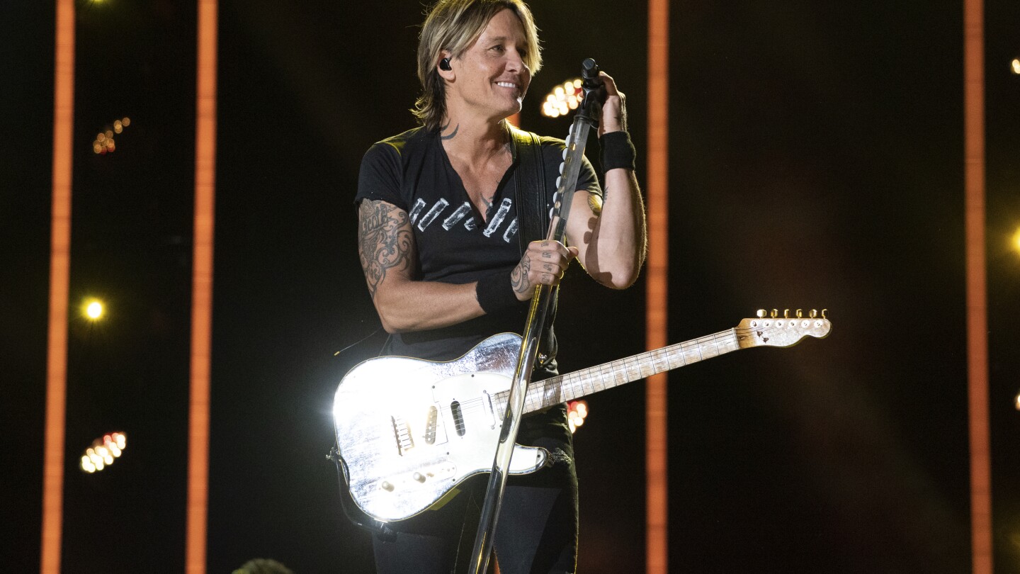 Keith Urban says 'High' is about order and chaos, with songs about love, life and his late father