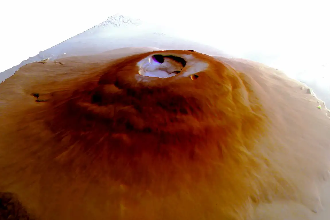 The largest volcanoes on Mars have frosted tips during winter