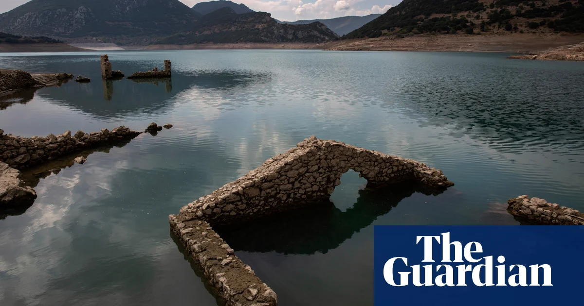 Re-emergence of Greece’s sunken village shows extent of rainfall crisis