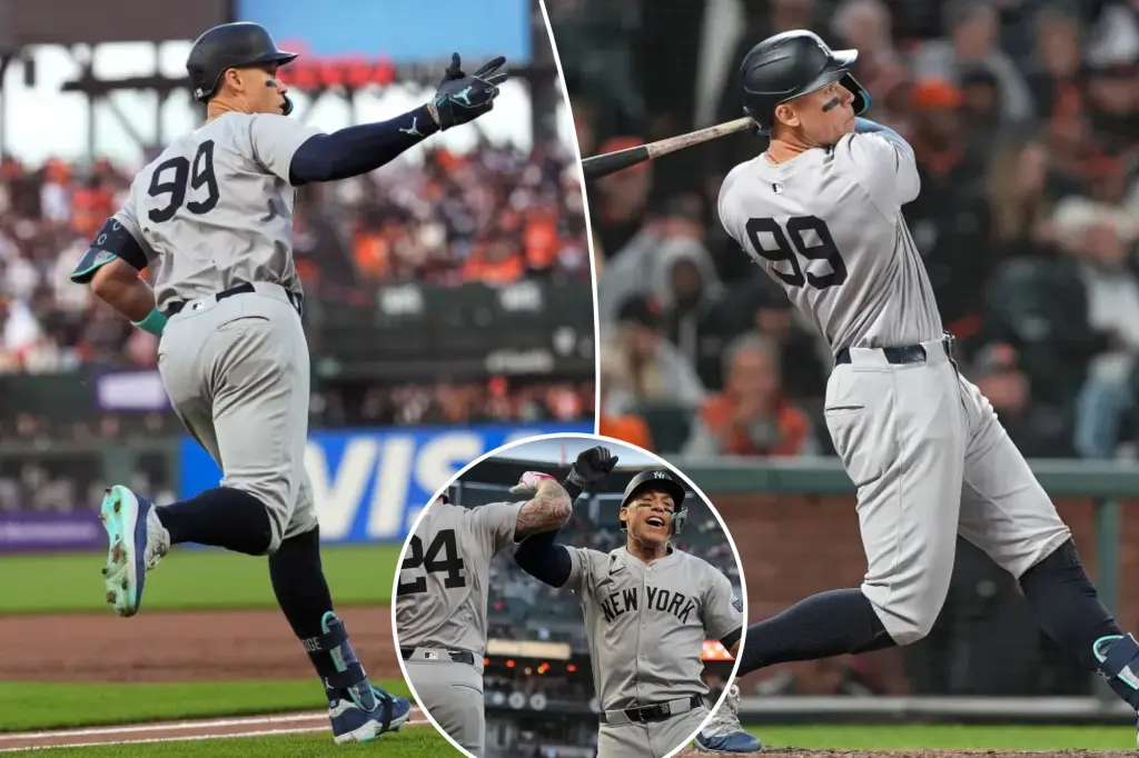 Aaron Judge answers boos with two homers in Yankees' win over Giants to close out historic month