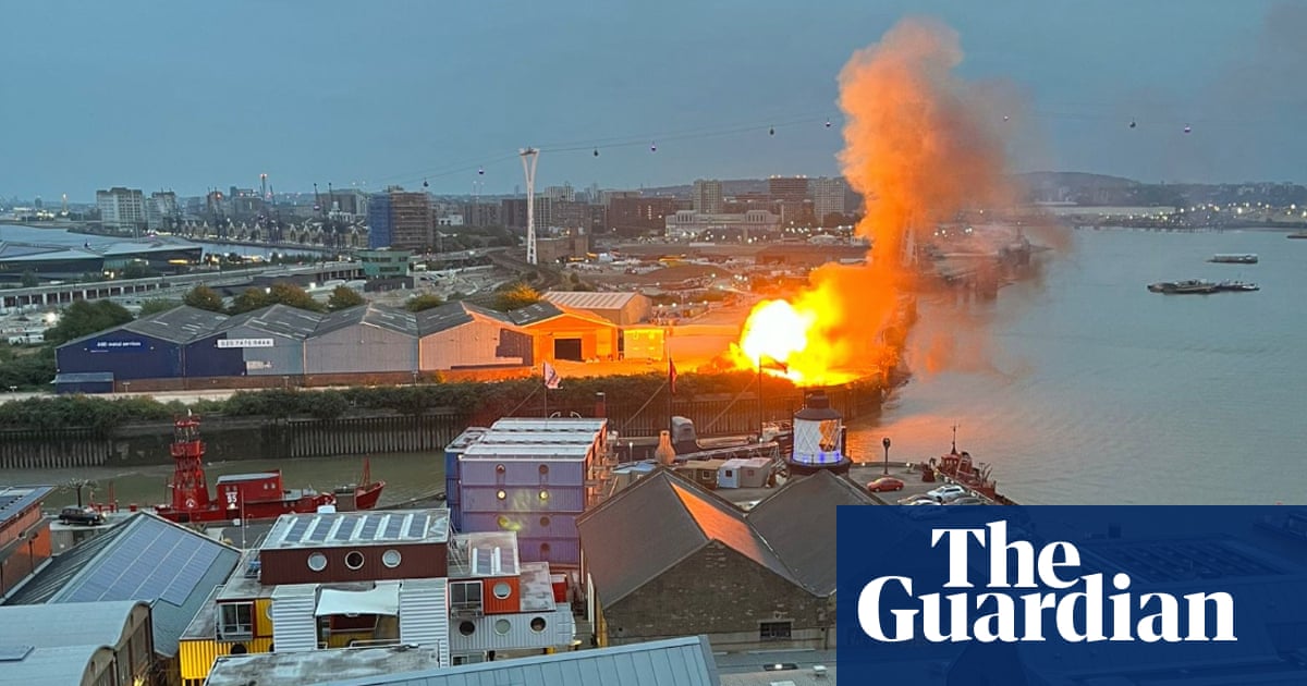 Fire crews tackle blaze after ‘pre-planned’ film set explosions near the O2