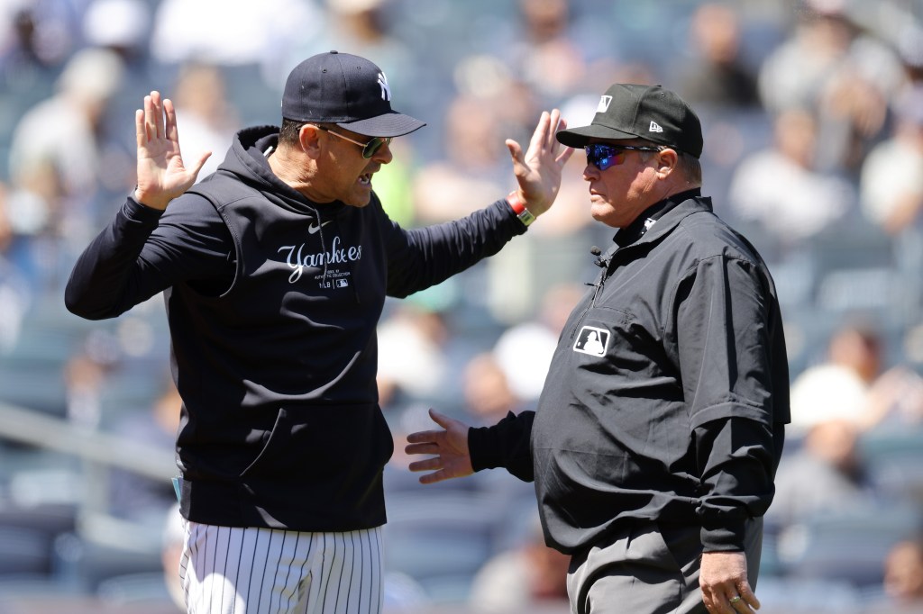 Yankees’ Aaron Boone immediately ejected vs. A’s, appears to blame fan for enraging home plate ump in 2-0 loss