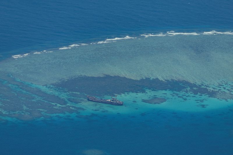 China says Philippine warships 'damaged' reef at atoll in South China Sea