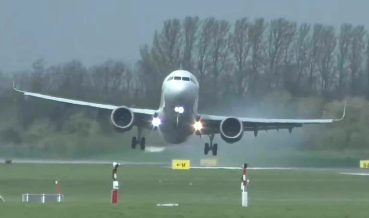 UK weather: Terrifying moment plane bounces off runway in 70mph gales as Storm Kathleen chaos grounds over...