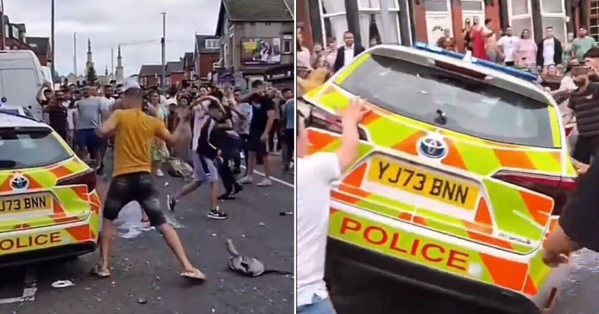 Leeds riots live: Chaos on streets as angry mob smashes up police cars in sickening scenes