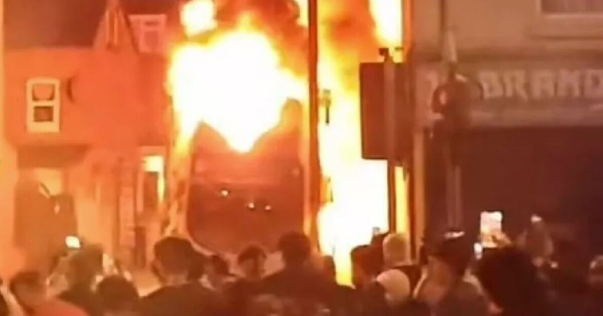 Leeds riots: Double-decker bus explodes into flames after angry thugs set fires in road