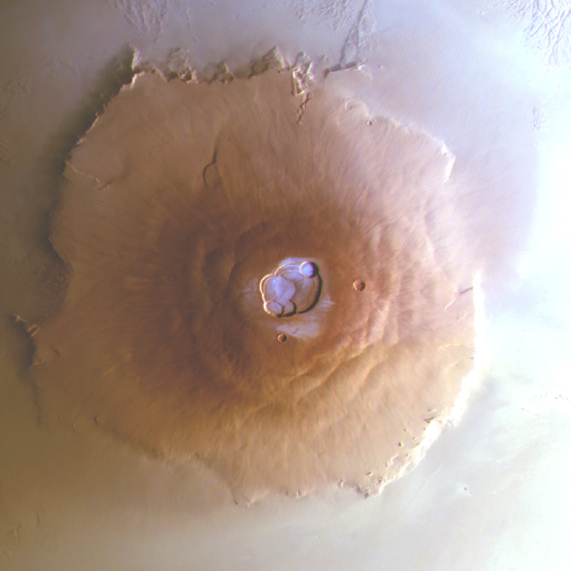 First detection of frost on the solar system's tallest volcanoes on Mars