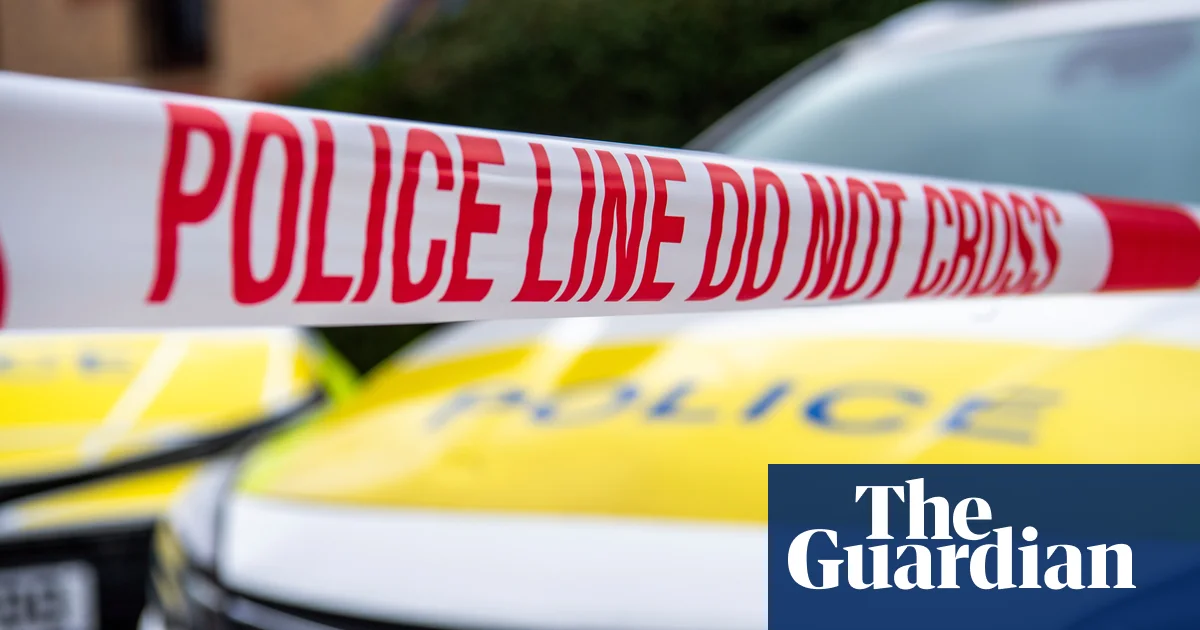 Three children and man found dead in Surrey house