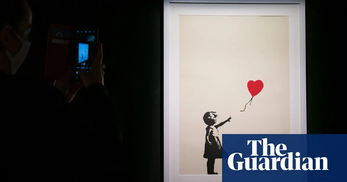 Two men charged after Banksy artwork stolen from London gallery